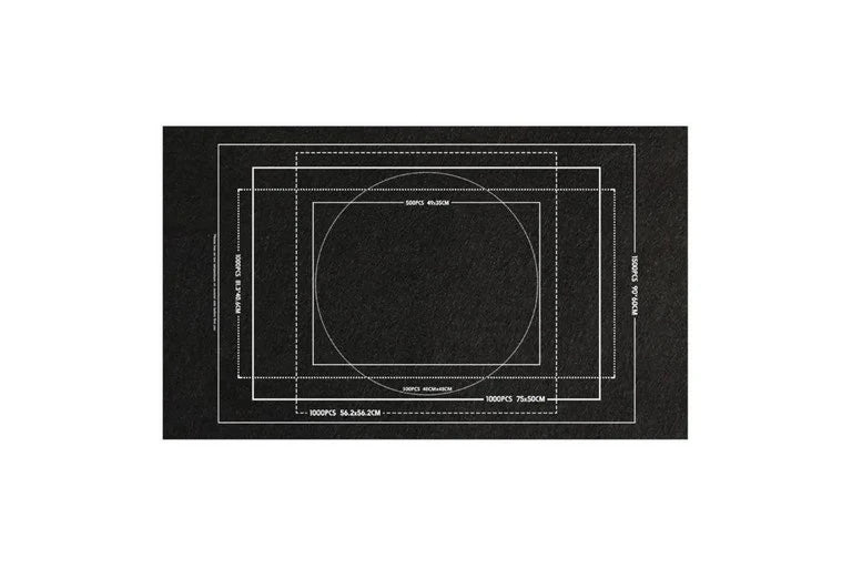 Black puzzle mat with white printed guides for positioning puzzles of
different dimensions.