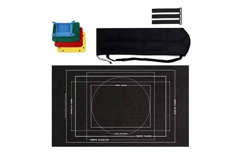 Black roll-up puzzle mat with printed guides, four colorful sorting trays,
three straps, and a carrying bag.